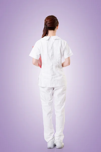 Mulher enfermeira asiática, visão traseira — Fotografia de Stock