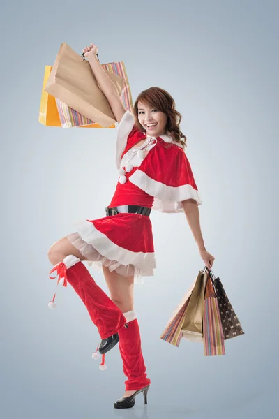 Asiático Navidad chica hold compras bolsas — Foto de Stock
