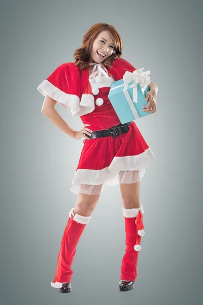 Smile happy Asian Christmas girl hold gift box — Stock Photo, Image