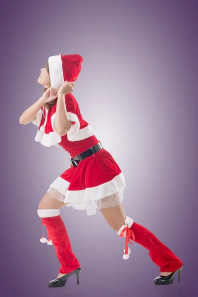 Christmas girl pull something — Stock Photo, Image