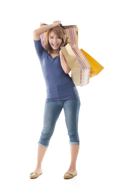 Cheerful shopping woman Stock Picture