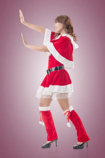 Navidad chica empujar algo — Foto de Stock