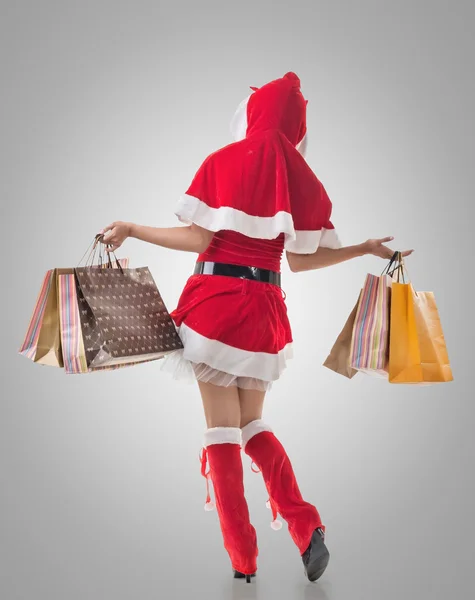 圣诞节的女孩举行购物袋 — 图库照片