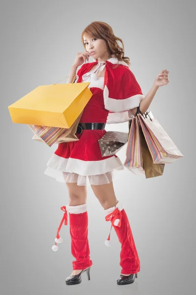 Aziatische Kerstmis meisje greep shopping tassen — Stockfoto