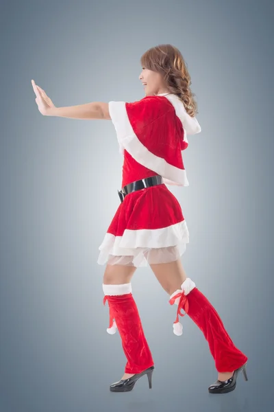 Christmas girl push something — Stock Photo, Image