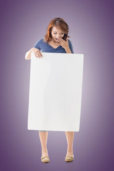 Excited Asian girl hold a blank board — Stock Photo, Image