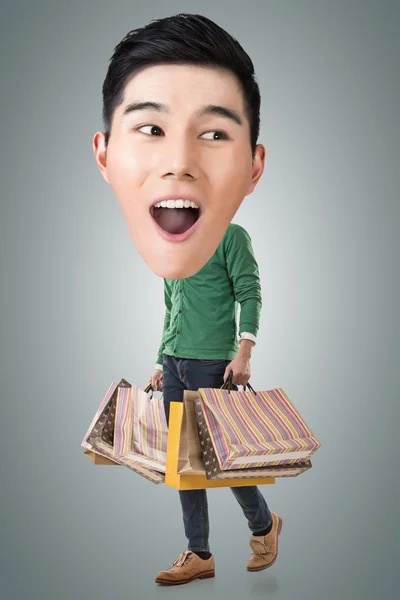 Funny shopping Asian guy — Stock Photo, Image