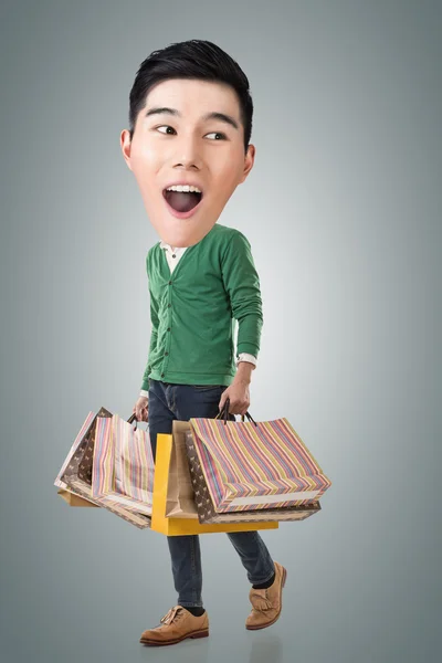 Funny shopping Asian guy — Stock Photo, Image