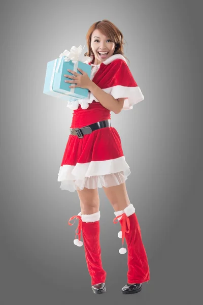 Smile happy Asian Christmas girl hold gift box — Stock Photo, Image