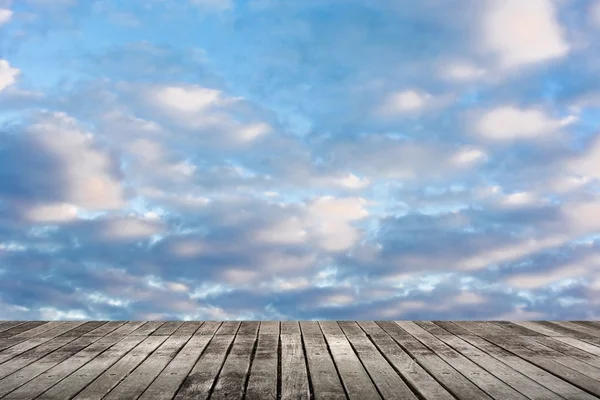 Clouds on heaven above the ground — Stock Photo, Image