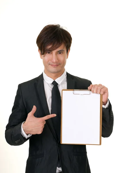 Asian businessman with note — Stock Photo, Image