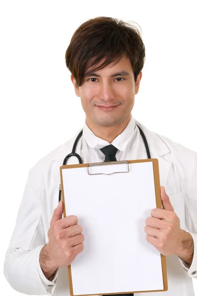 Médico segurando placa em branco — Fotografia de Stock