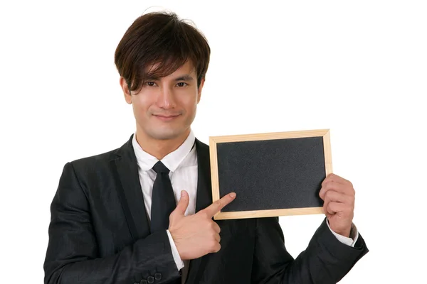 Blackboard and businessman — Stock Photo, Image