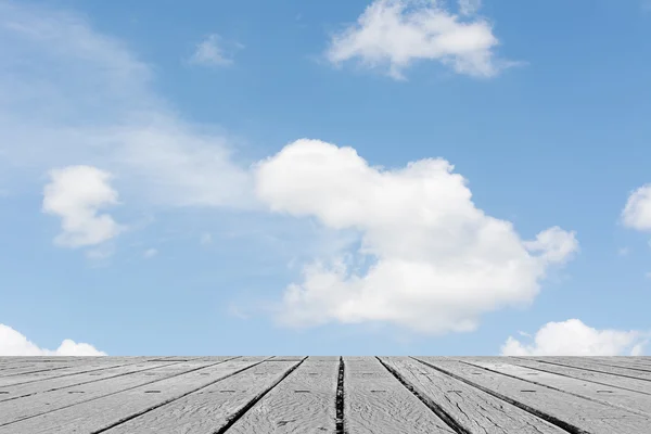 Clouds on heaven above the ground — Stock Photo, Image