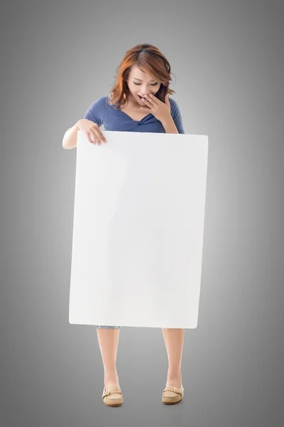 Excited Asian girl hold a blank board — Stock Photo, Image