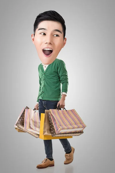 Funny shopping Asian guy — Stock Photo, Image