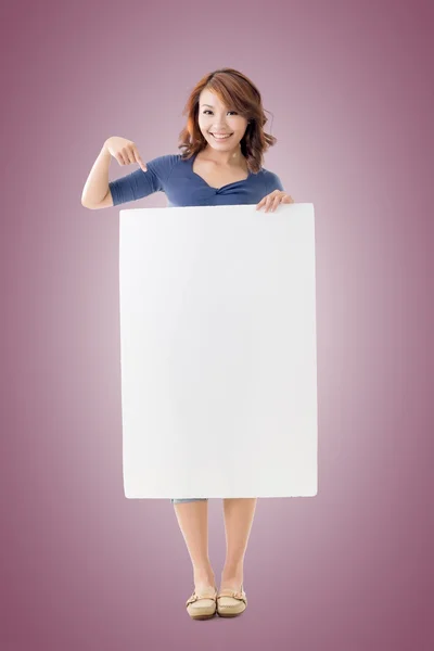 Excited Asian girl hold a blank board — Stock Photo, Image