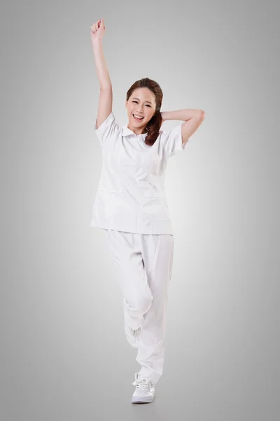 Cheerful Asian nurse — Stock Photo, Image