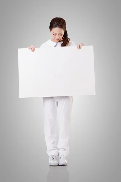 Nurse with blank board — Stock Photo, Image