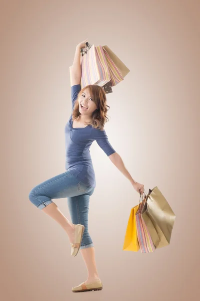 Veselá nákupní žena — Stock fotografie