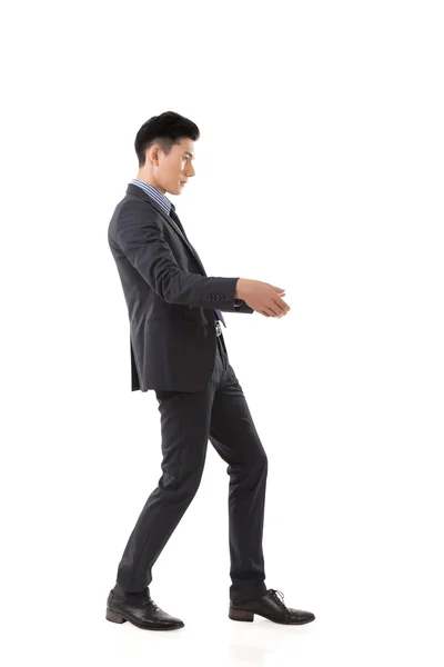 Holding pose of Asian business man — Stock Photo, Image