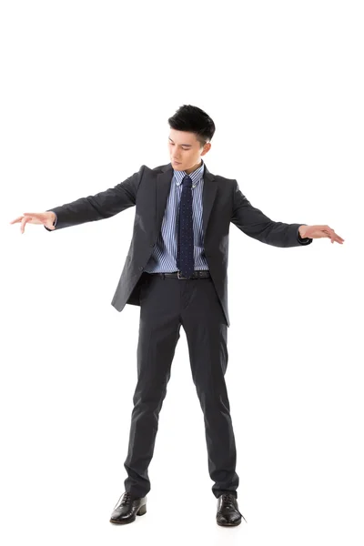 Holding pose of Asian business man — Stock Photo, Image