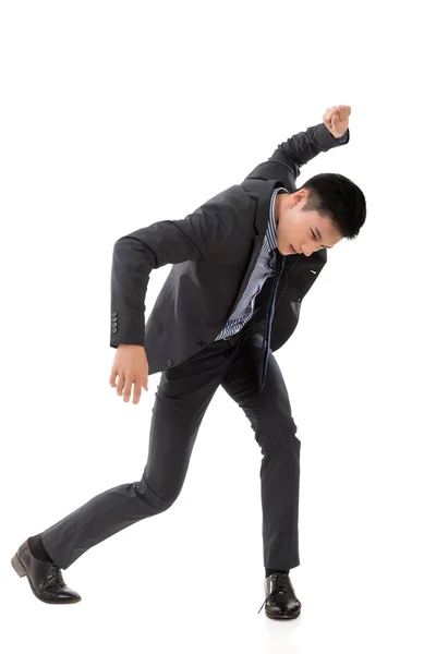 Struggle pose of Asian business man — Stock Photo, Image