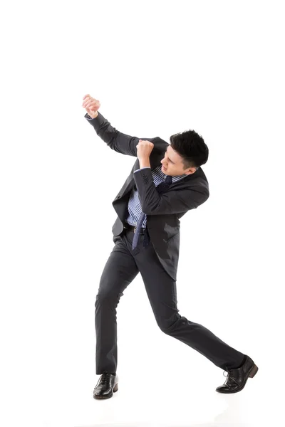 Struggle pose of Asian business man — Stock Photo, Image