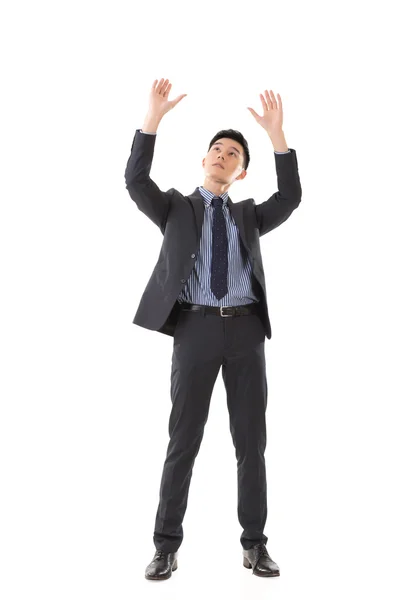 Holding pose of Asian business man Stock Photo