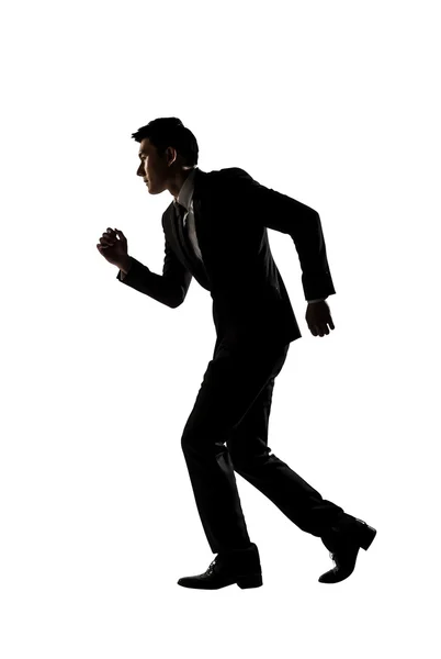 Confident businessman running — Stock Photo, Image