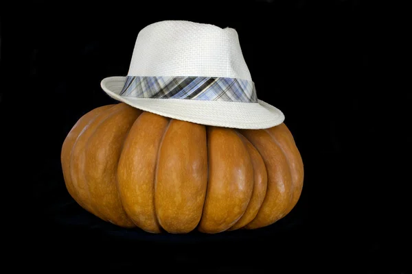 Pumpkin with hat  isolated on black — Stock Photo, Image