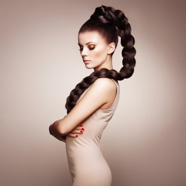 Portrait of beautiful sensual woman with elegant hairstyle clipart