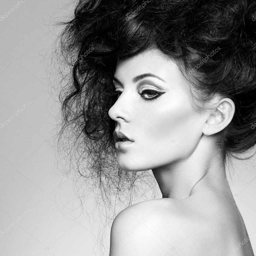 Portrait of beautiful sensual woman with elegant hairstyle