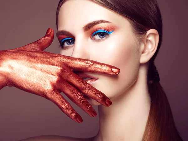 Portrait of beautiful young woman with art make-up — Stock Photo, Image