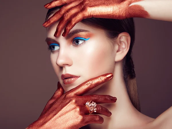 Portrait of beautiful young woman with art make-up — Stock Photo, Image