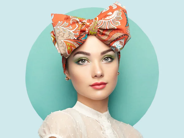 Portrait of beautiful young woman with bow — Stock Photo, Image