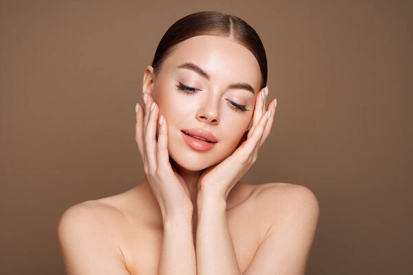 Portrait beautiful young woman with clean fresh skin. Model with healthy skin, close up portrait. Cosmetology, beauty and spa