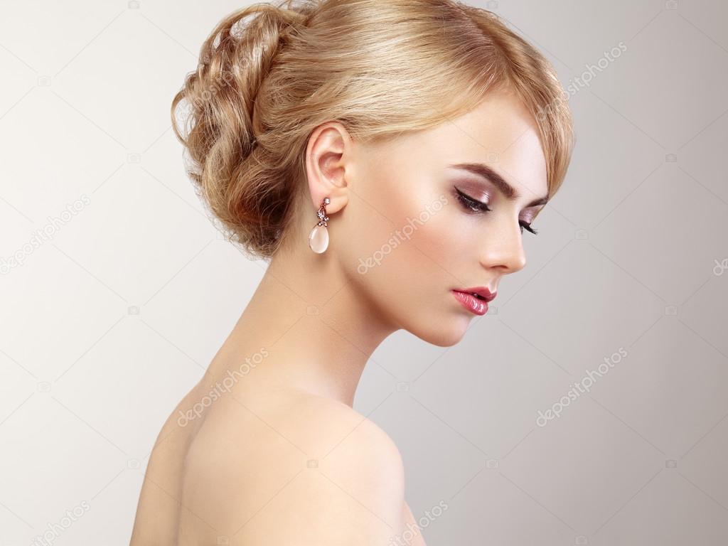 Portrait of beautiful sensual woman with elegant hairstyle