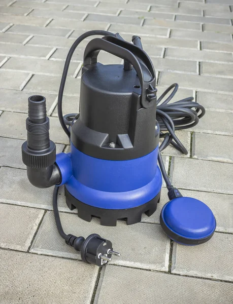 New Low Power Submersible Pump Blue Plastic Housing Stone Floor — Stock Photo, Image