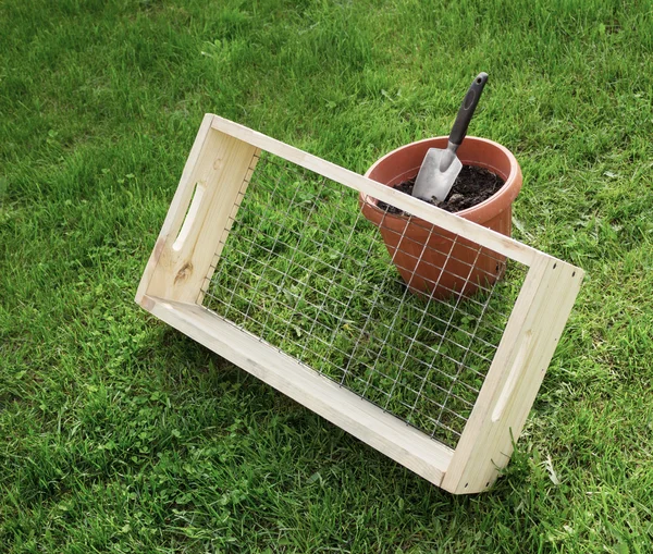 Sieve for garden works and scoop — Stock Photo, Image