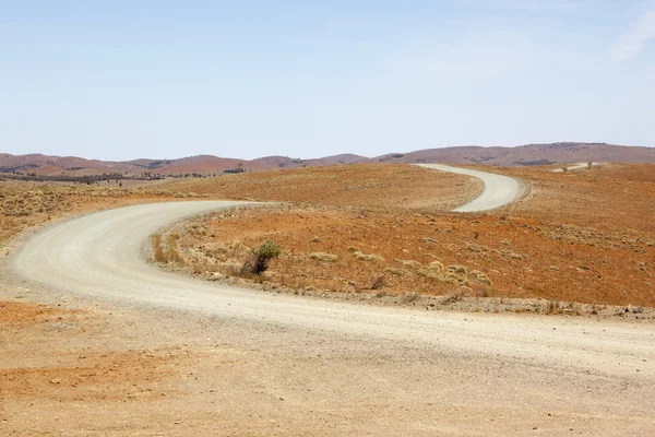Estrada de terra do deserto — Fotografia de Stock