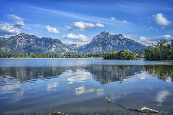 Neuschwanstein no lago Forggensee — Fotografia de Stock