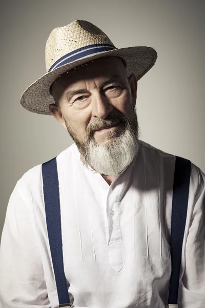 Senior male portrait wearing hat — Stock Photo, Image