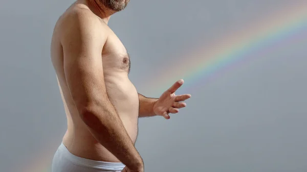 Das Bild Eines Nackten Mannes Und Eines Regenbogens — Stockfoto