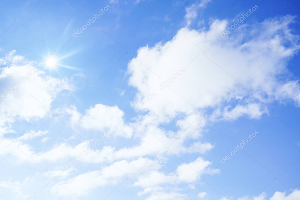 An image of a blue sky white clouds sunshine background