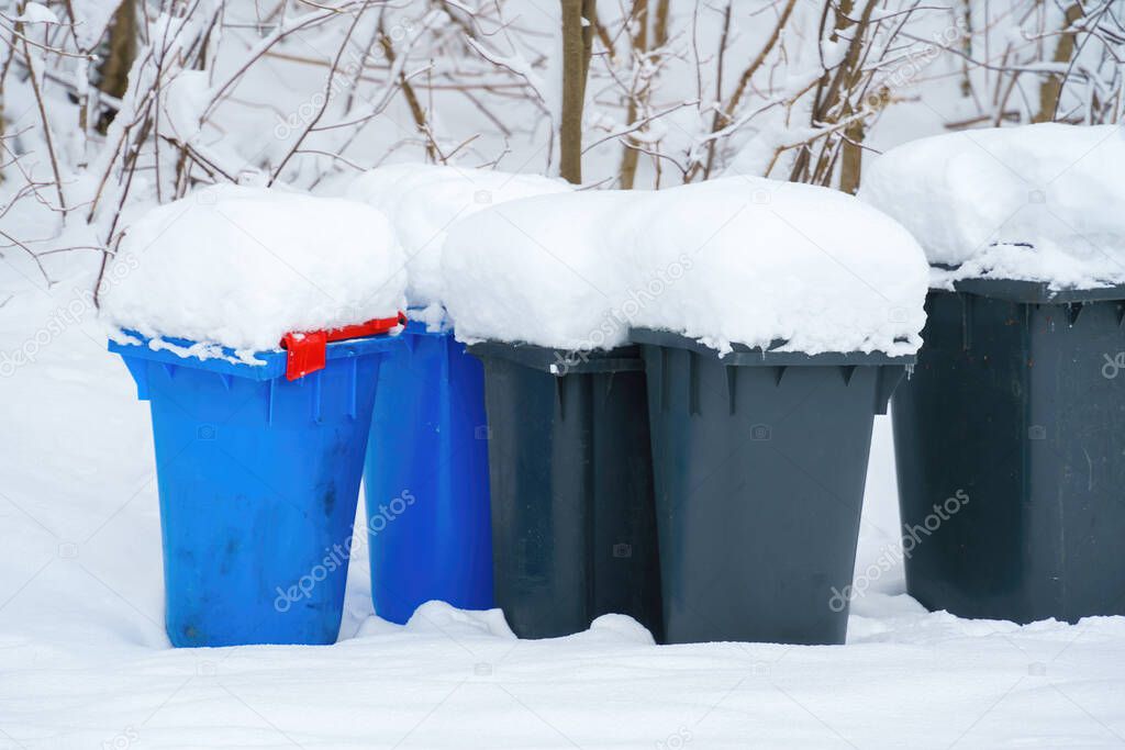 An image of some dumpster with snow