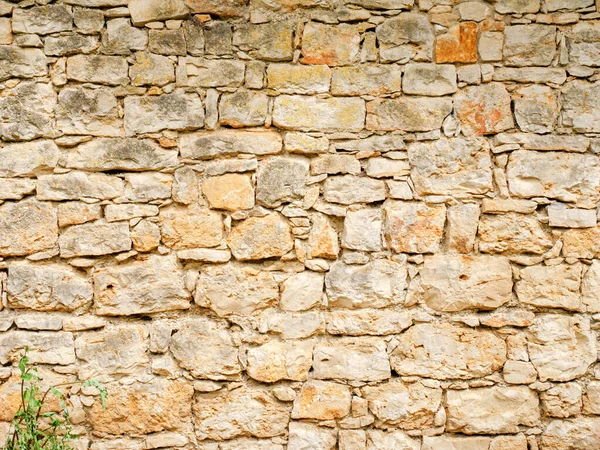 Een Afbeelding Van Een Oude Zandstenen Muur — Stockfoto