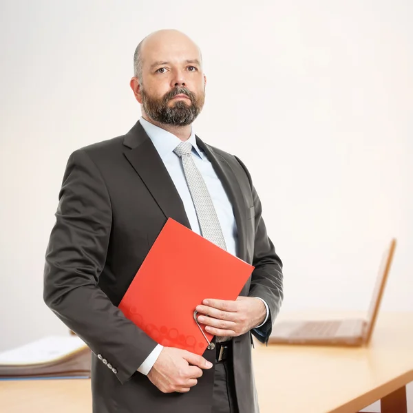 Business man with red folder — Stock Photo, Image