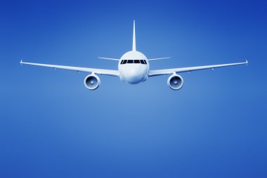 parlak mavi gökyüzünde uçak