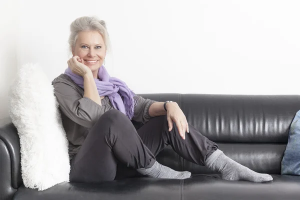 Aged woman relaxing — Stock Photo, Image